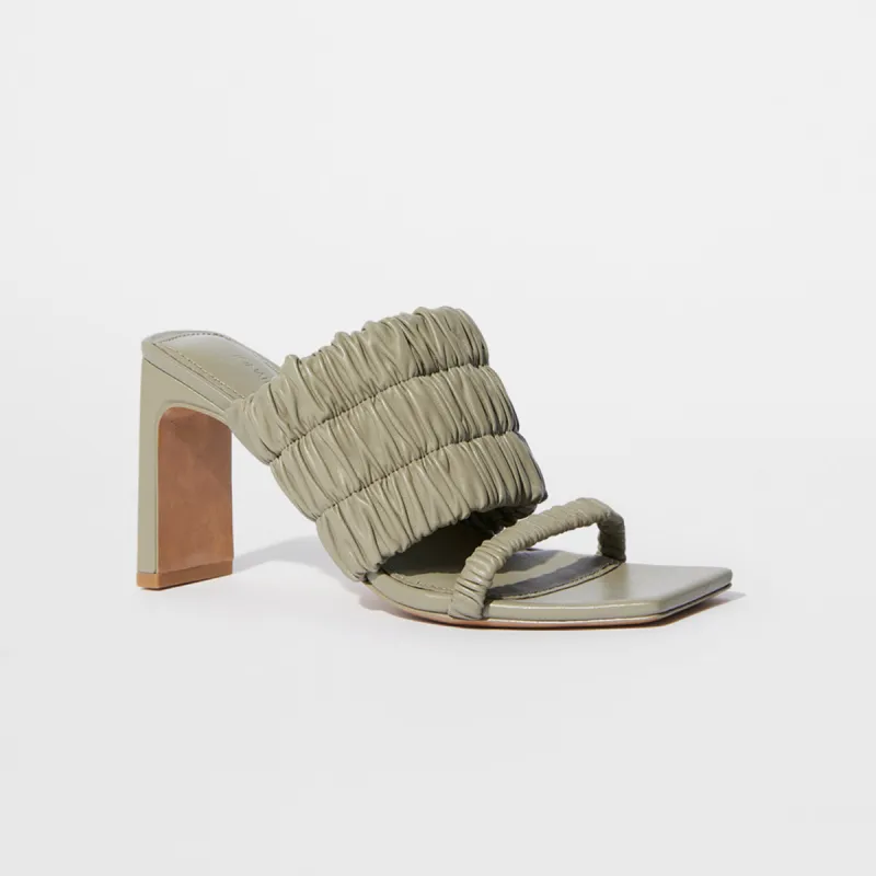 Felix Elastic Mules sold by Simkhai