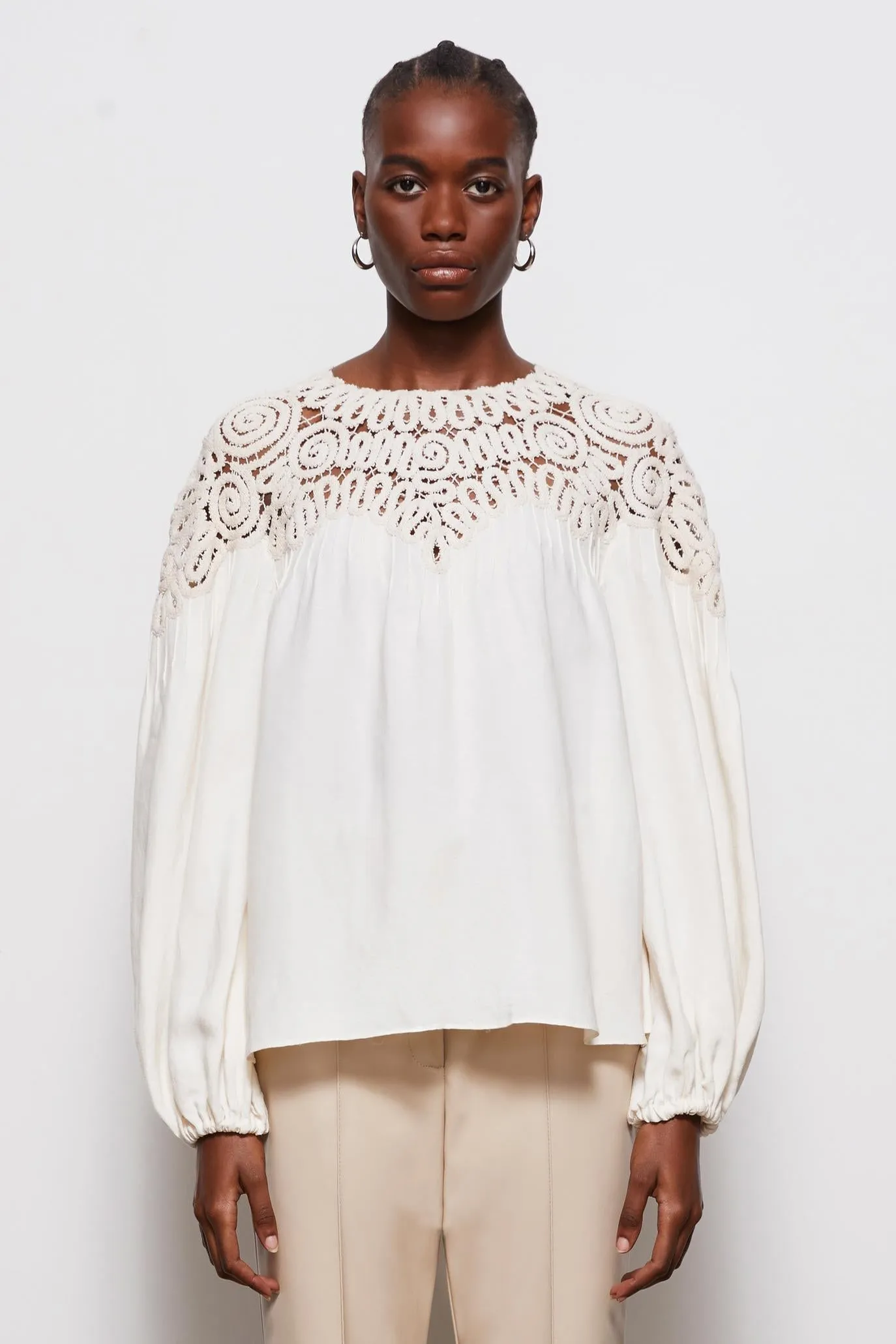 Maribel Embroidery Top sold by Simkhai