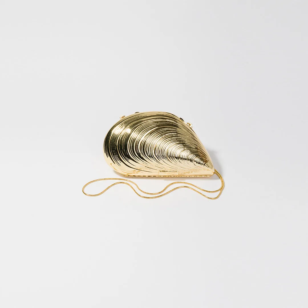 Bridget Metal Oyster Clutch sold by Simkhai