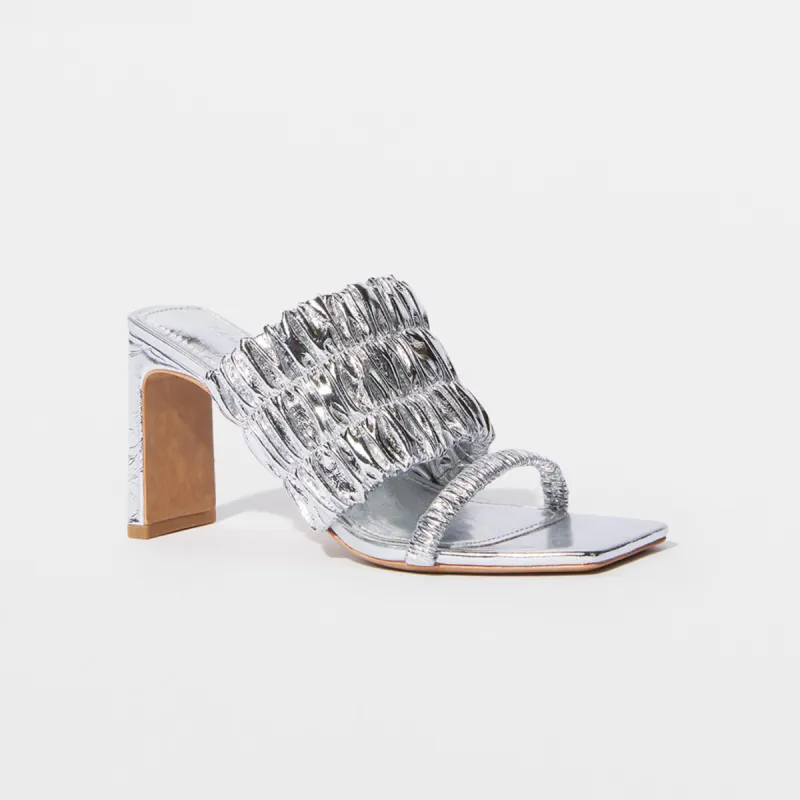 Felix Elastic Mules sold by Simkhai