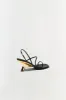 Shadow Sandal sold by Simkhai