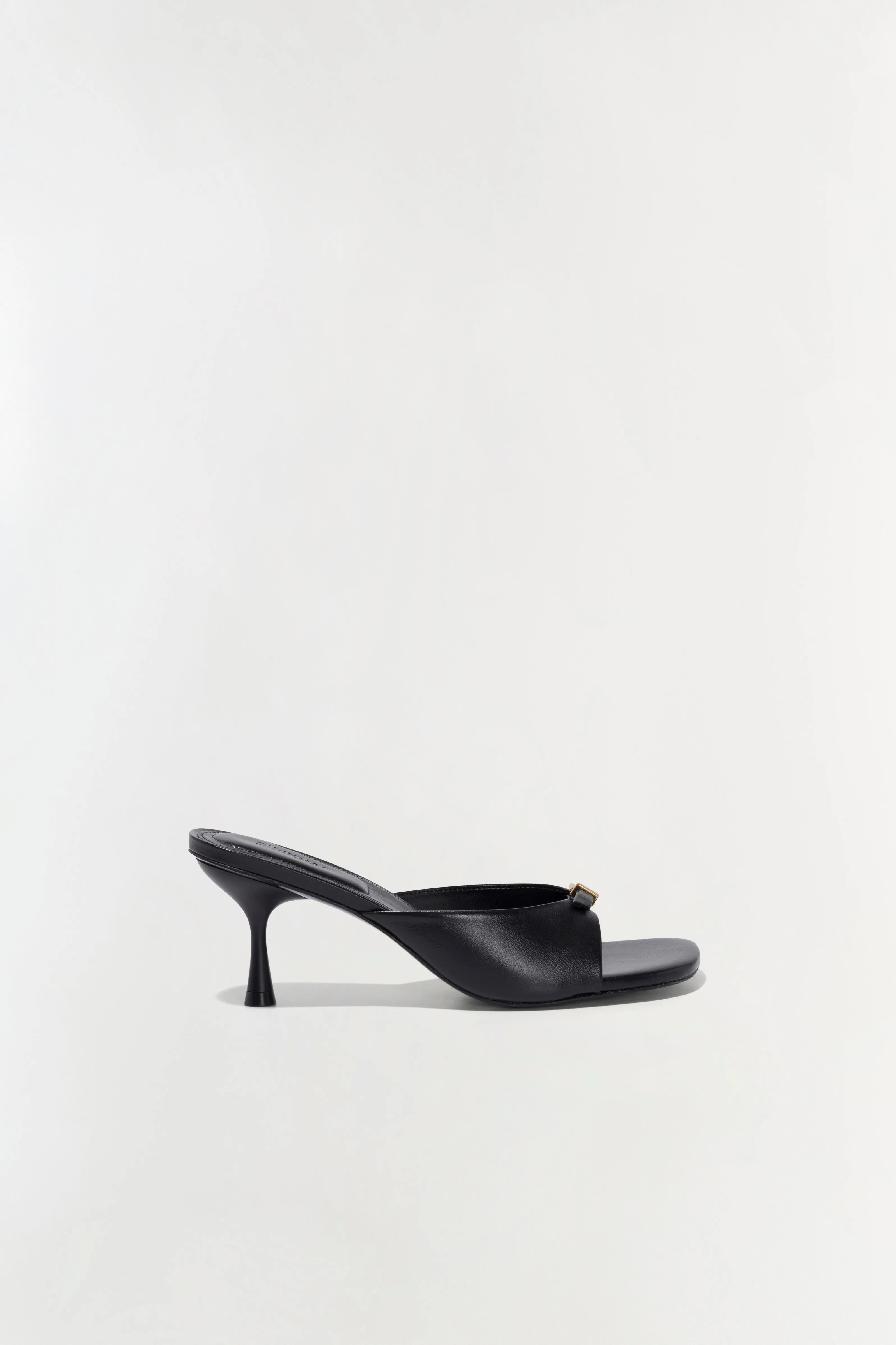 Carey Leather Mule sold by Simkhai