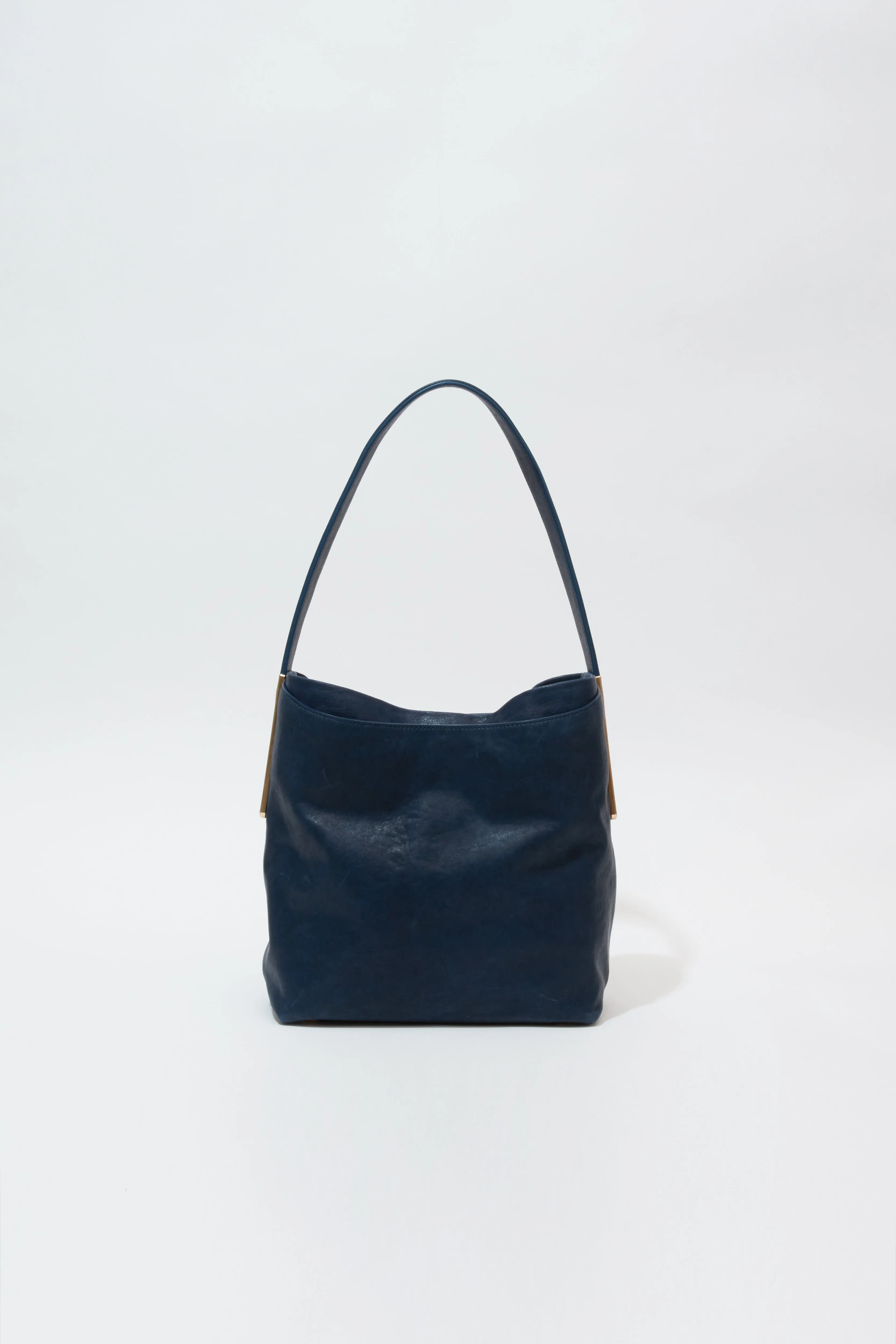 Wynn Sunbleached Leather Bucket Bag sold by Simkhai