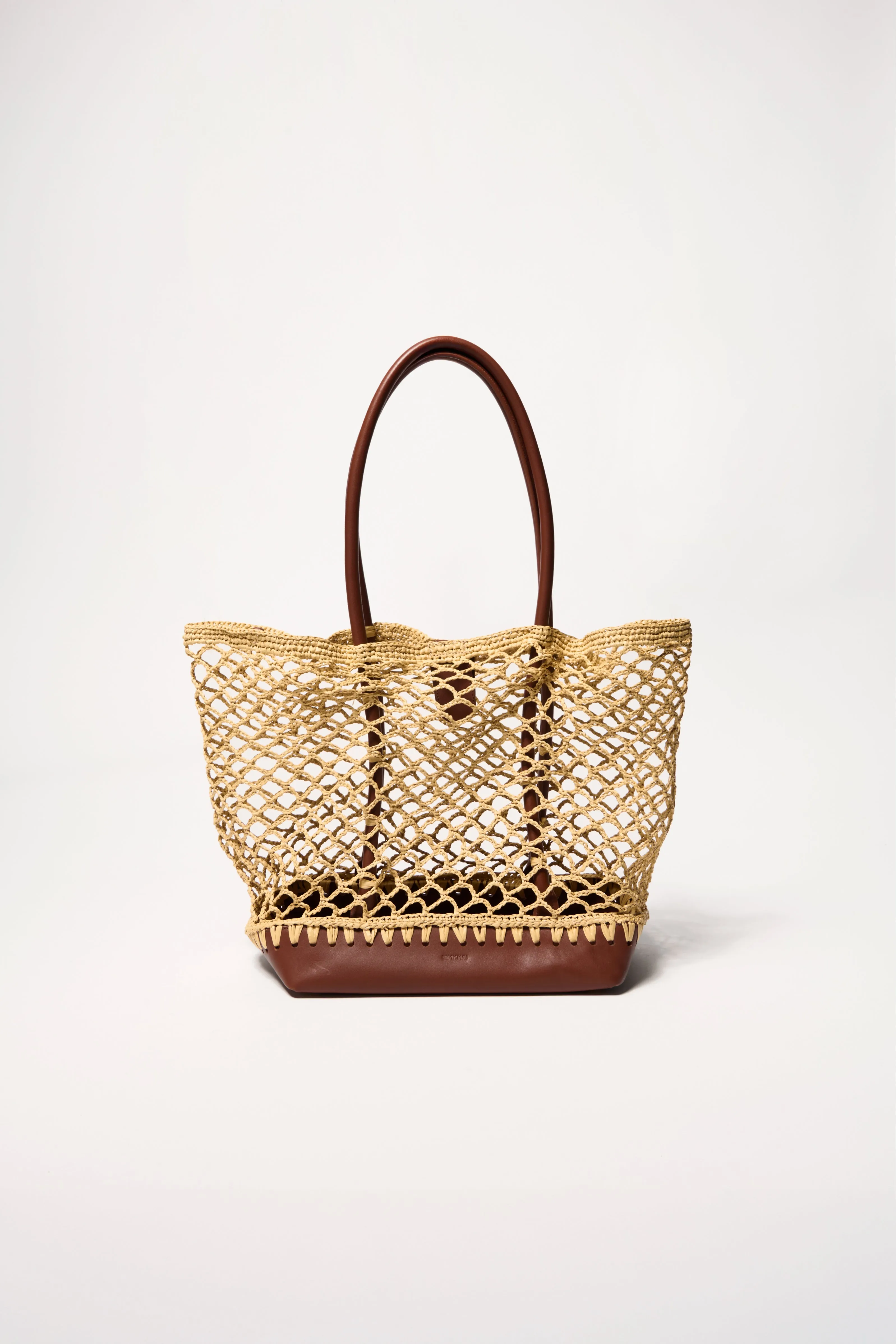 Caspian Raffia Tote sold by Simkhai