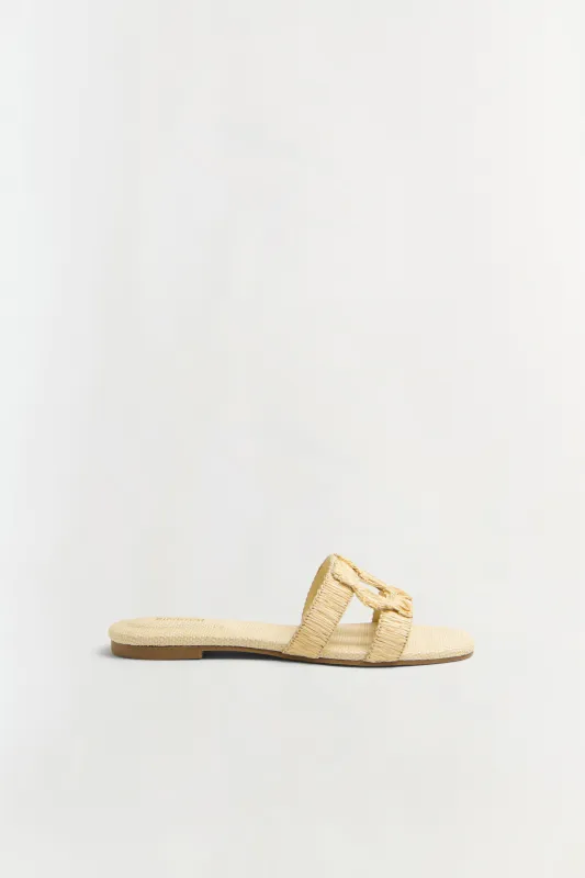 Simkhai Monogram Raffia Flat Slide sold by Simkhai