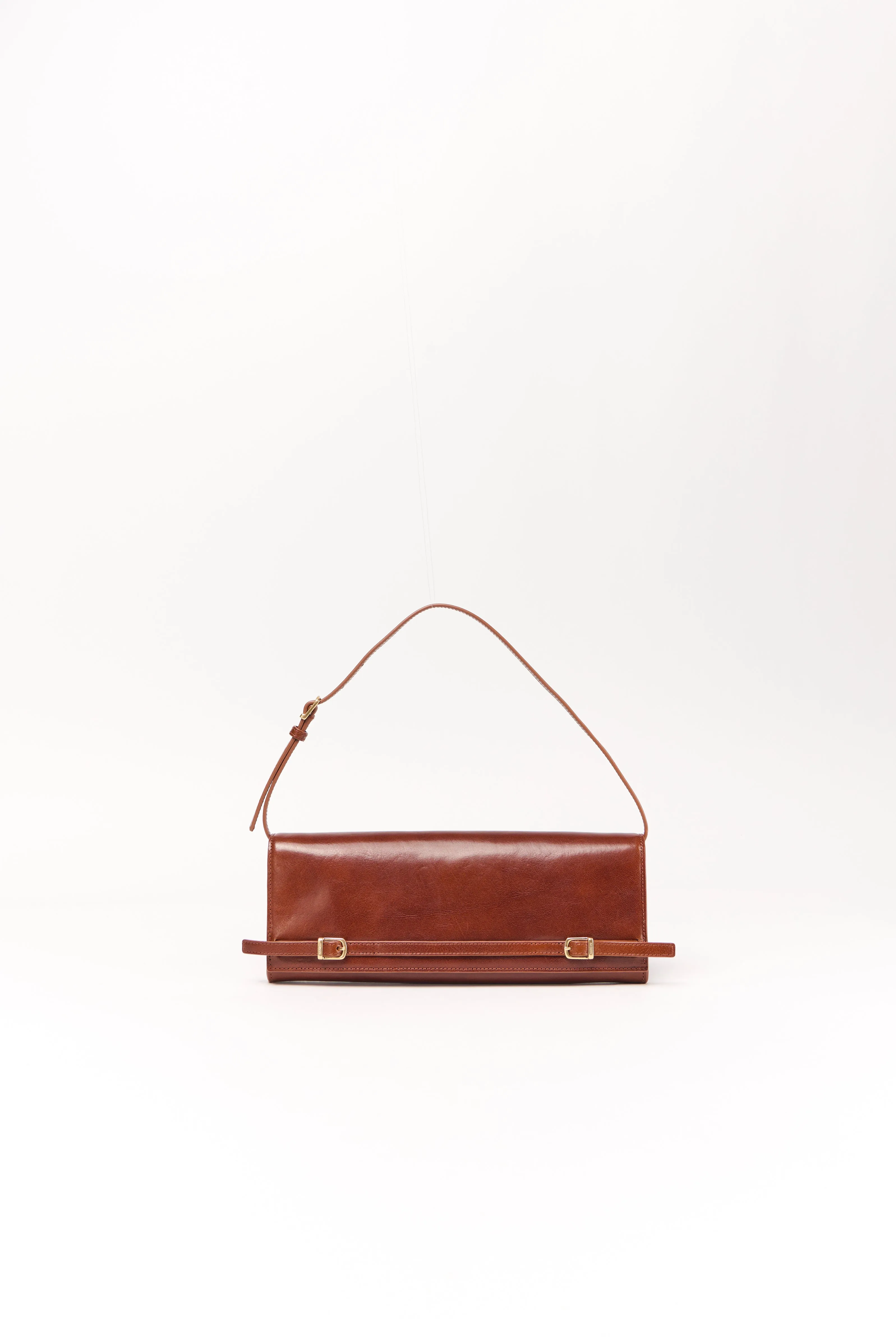 River East West Leather Clutch sold by Simkhai
