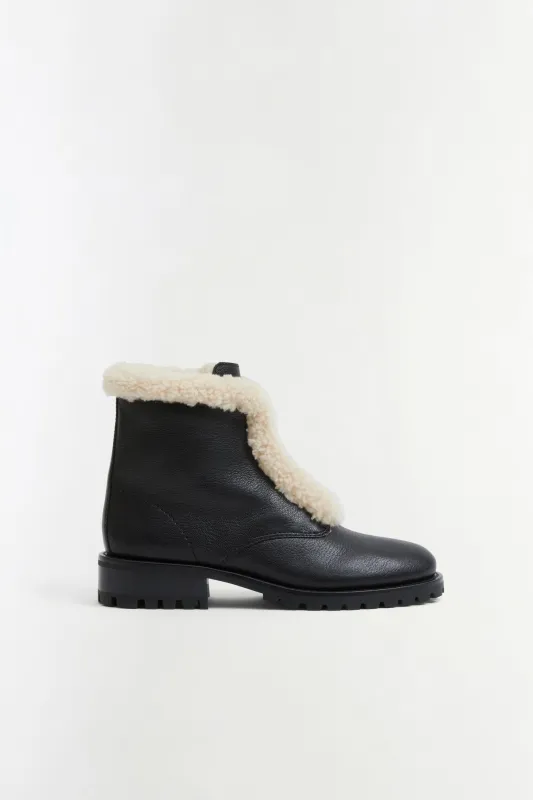 Noah Shearling Lug Sole Zip Boot made by Simkhai