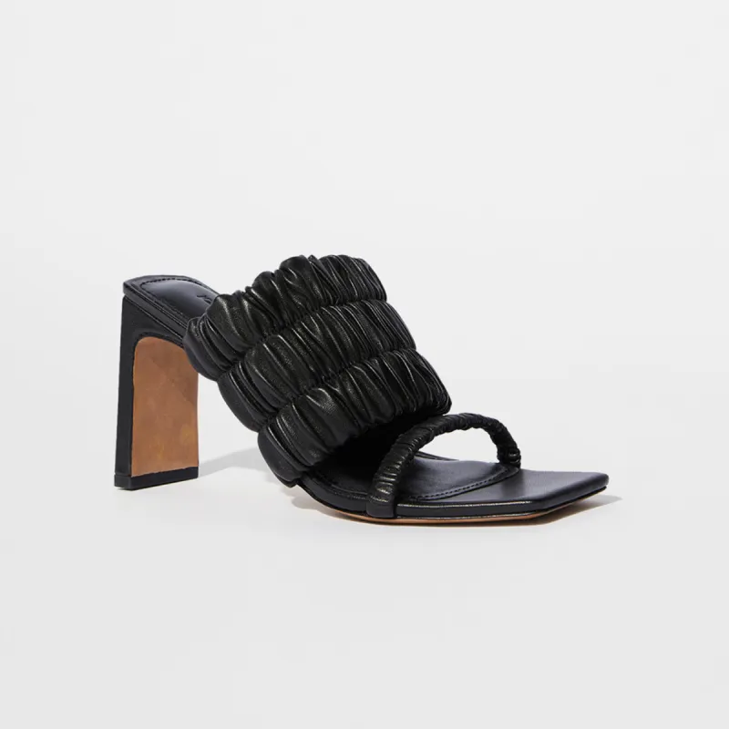 Felix Elastic Mules sold by Simkhai