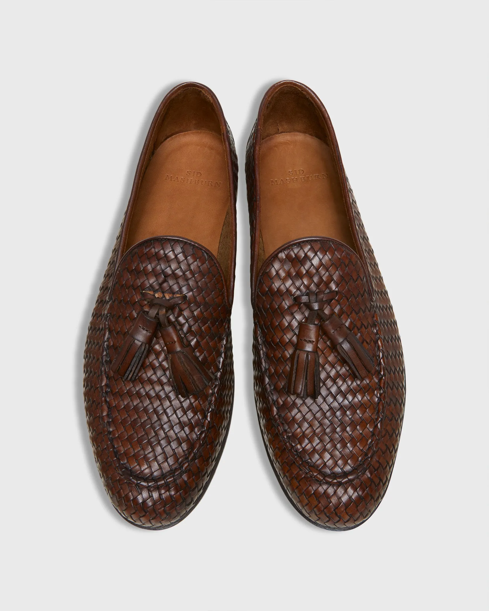Nassau Tassel Loafer in Brown Woven Leather sold by Mashburn