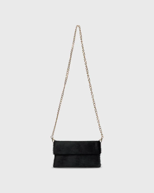 Paige Clutch in Black Calf Hair sold by Mashburn