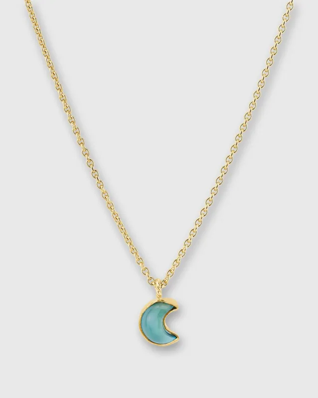 Moon Charm Necklace in Seafoam sold by Mashburn