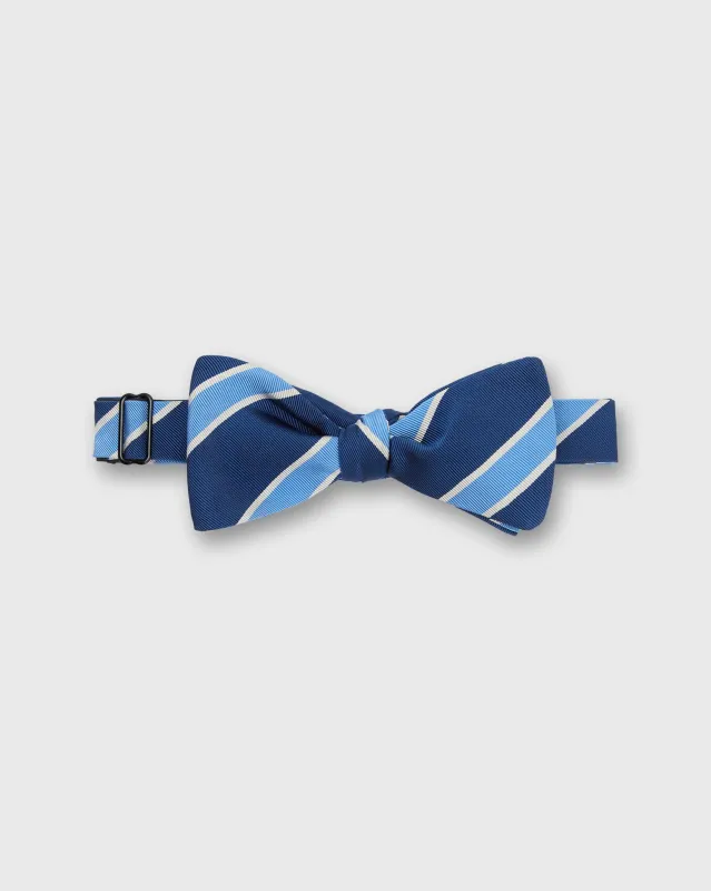 Silk Bow Tie in Navy/Cobalt Crescent Stripes sold by Mashburn