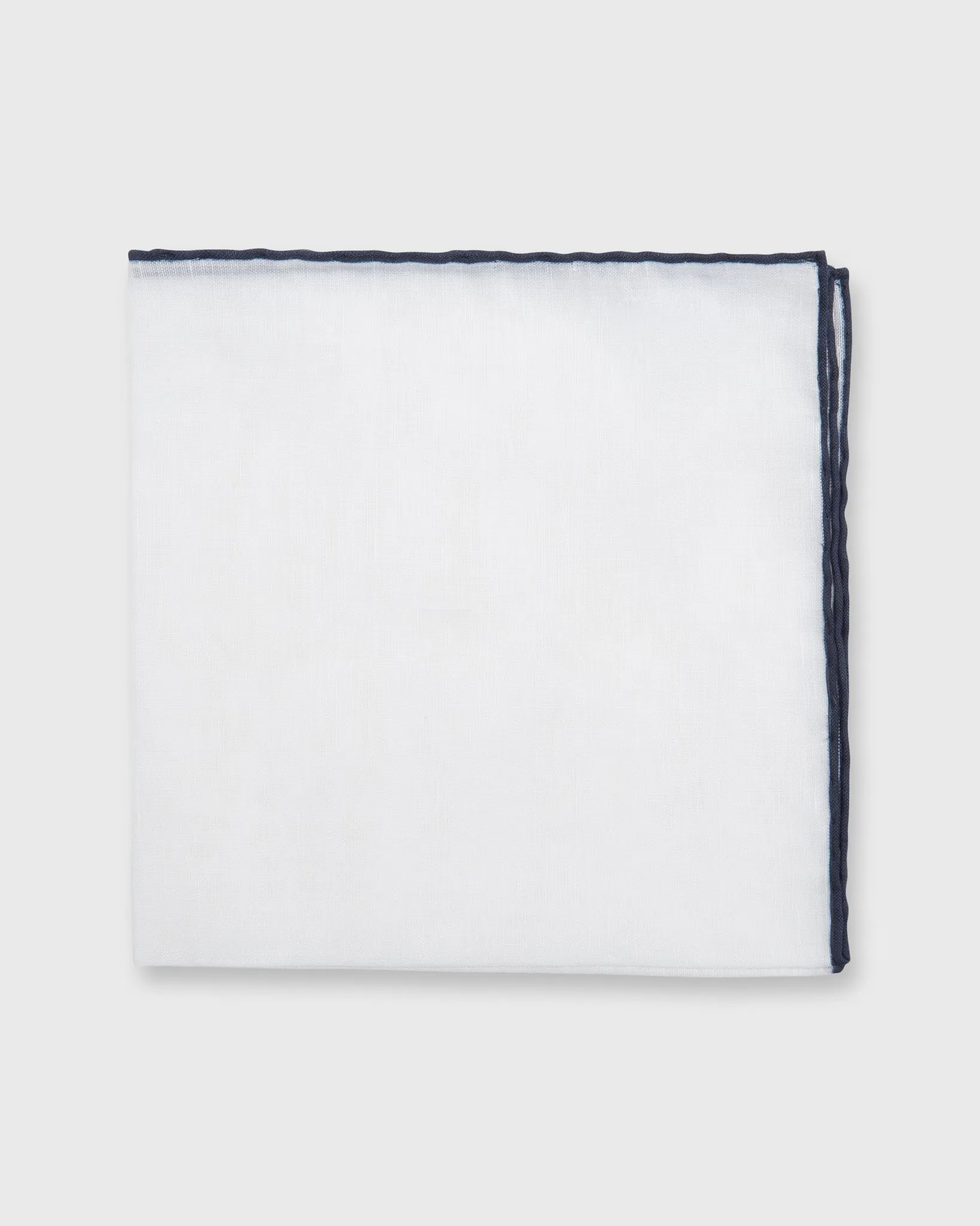 Hand-Rolled Pocket Square in White Cotolino/Navy Edge sold by Mashburn