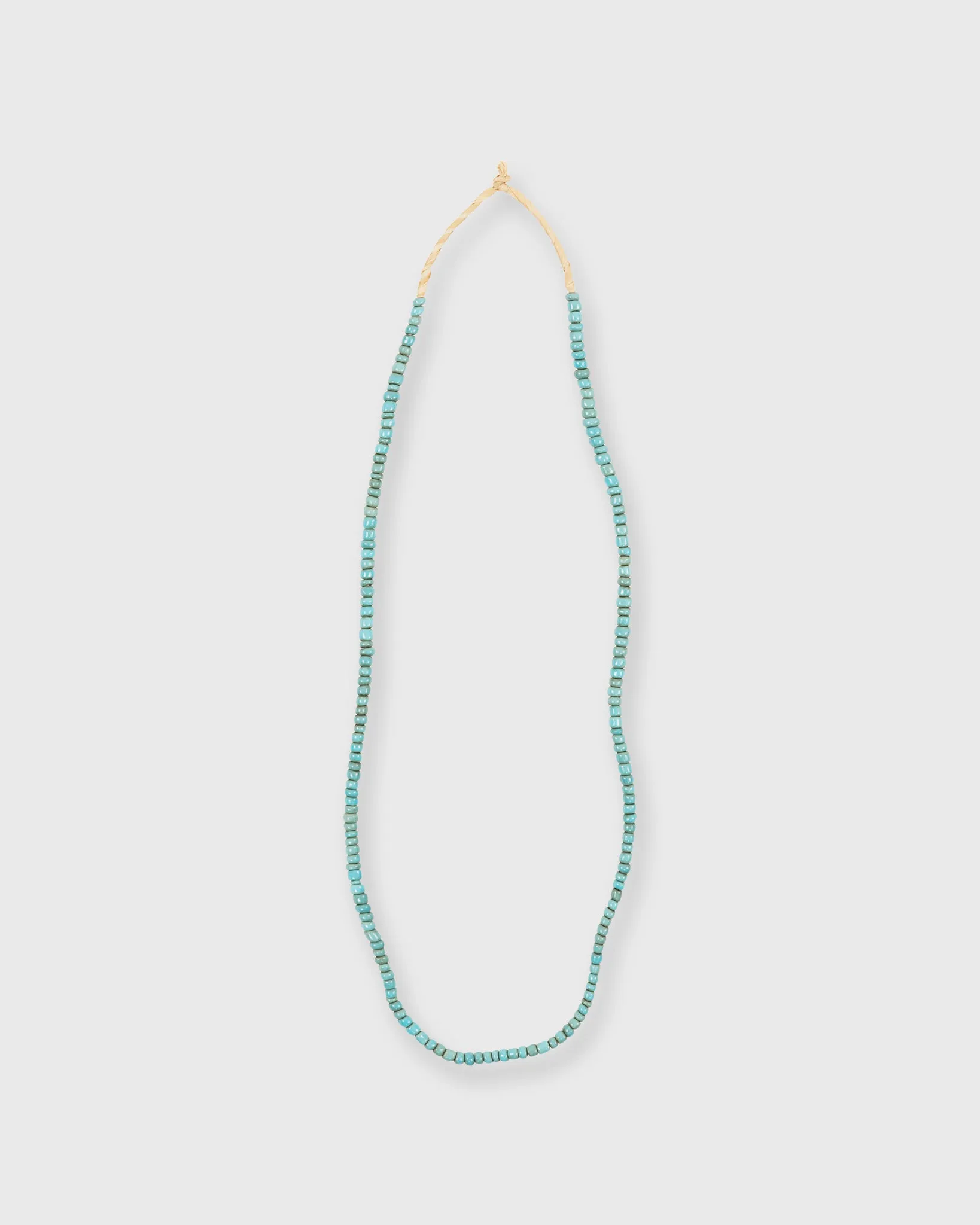 Very Small African Beads in Faded Turquoise sold by Mashburn