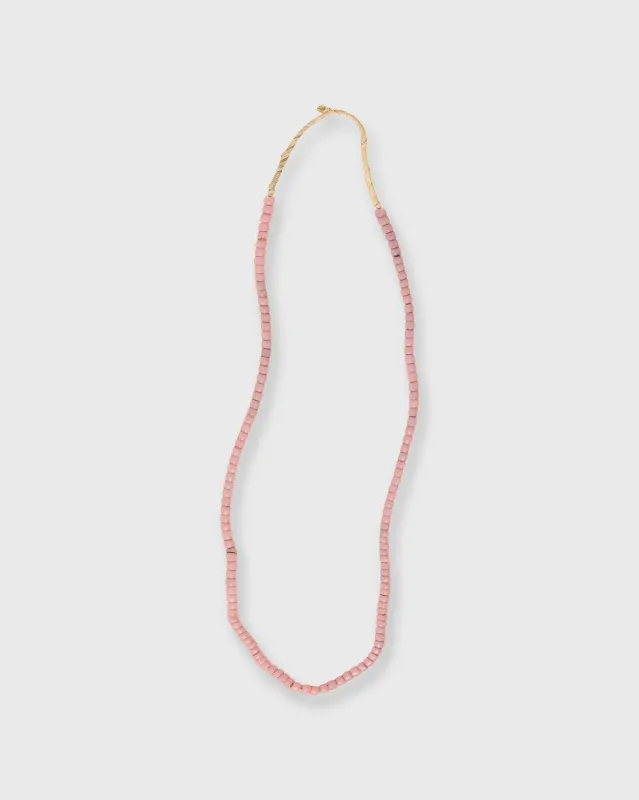 Small African Beads in Rose sold by Mashburn