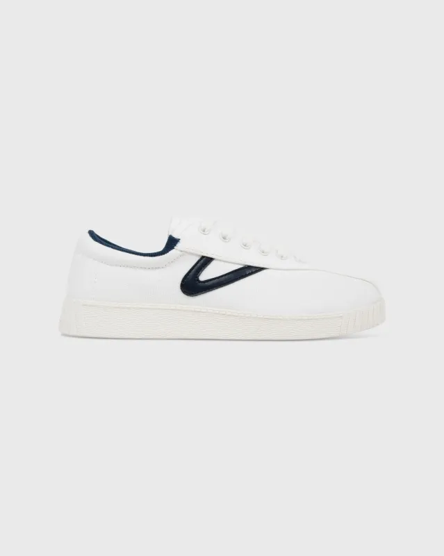 Women's Nylite Canvas Sneaker in White/Navy sold by Mashburn