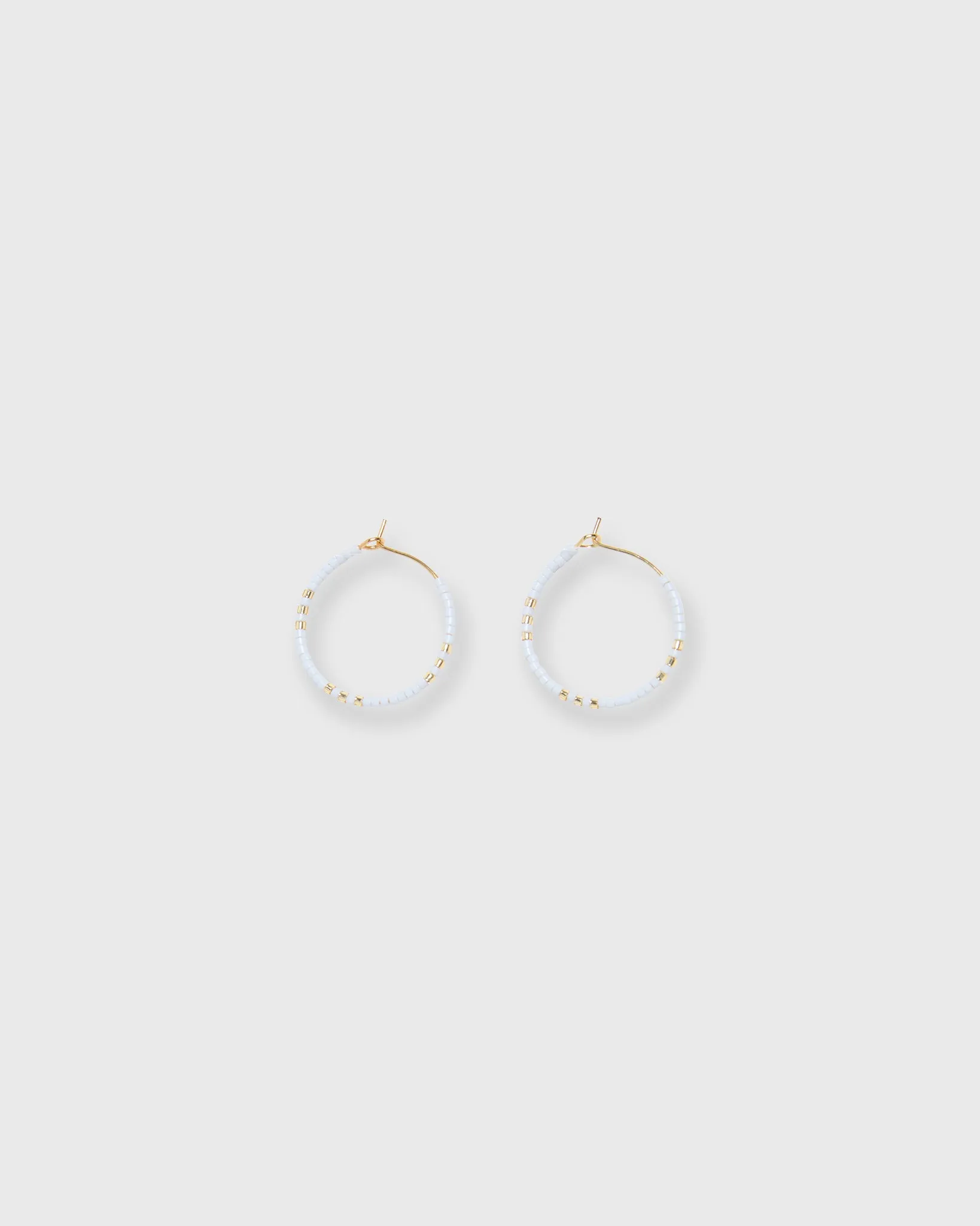 Zoe Hoop Earrings in Snow sold by Mashburn