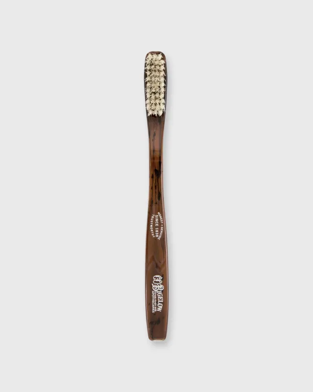 Soft Tortoise Toothbrush in Brown sold by Mashburn