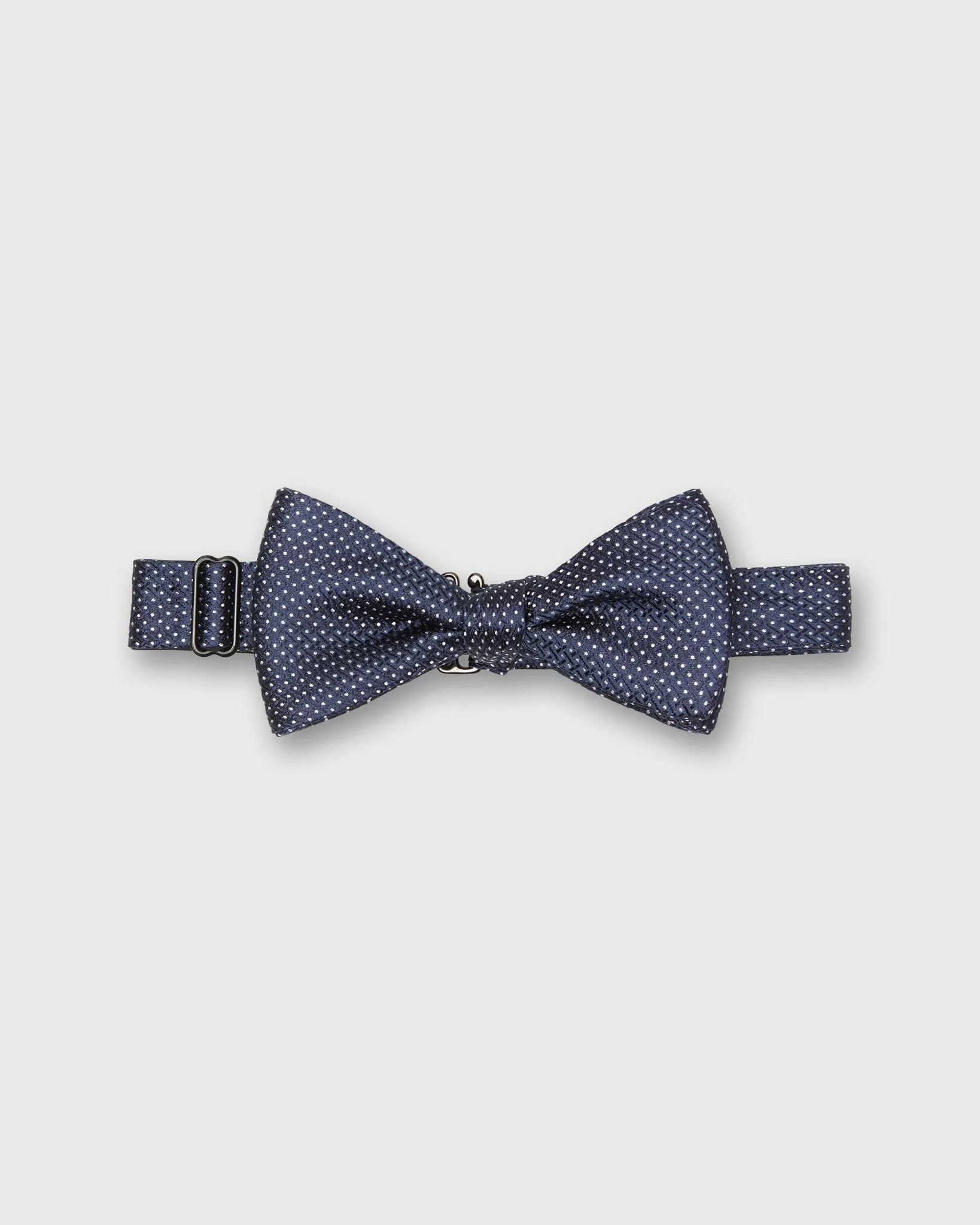 Silk Bow Tie in Navy Runnymede Pin Dots sold by Mashburn