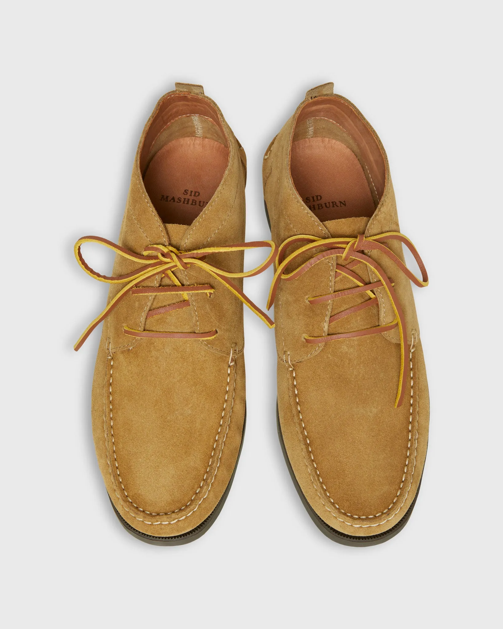 Chukka Camp Moccasin in Tan Suede sold by Mashburn