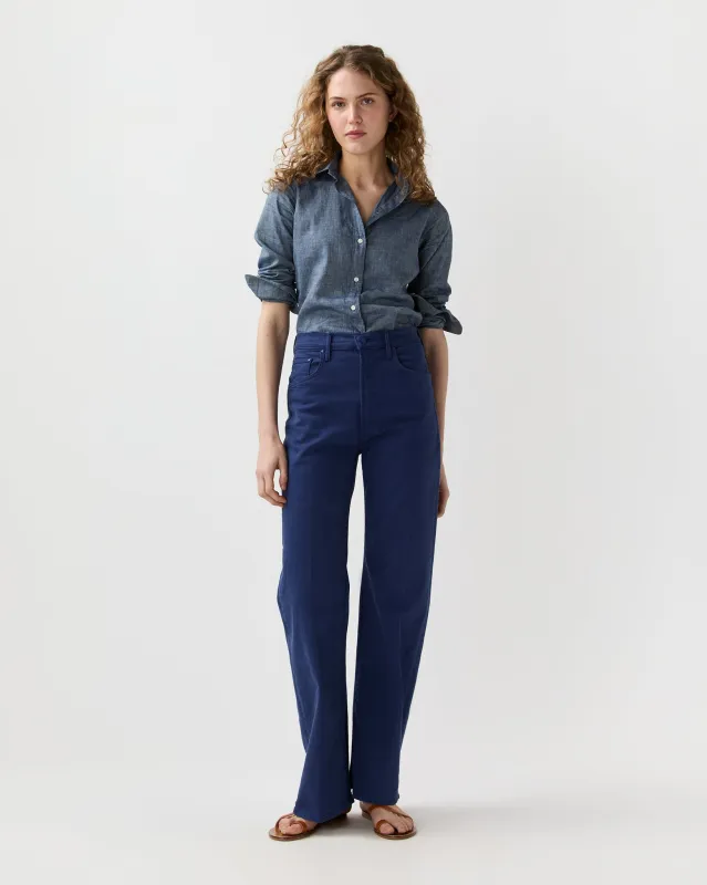 The Lasso Sneak Jean in Estate Blue sold by Mashburn