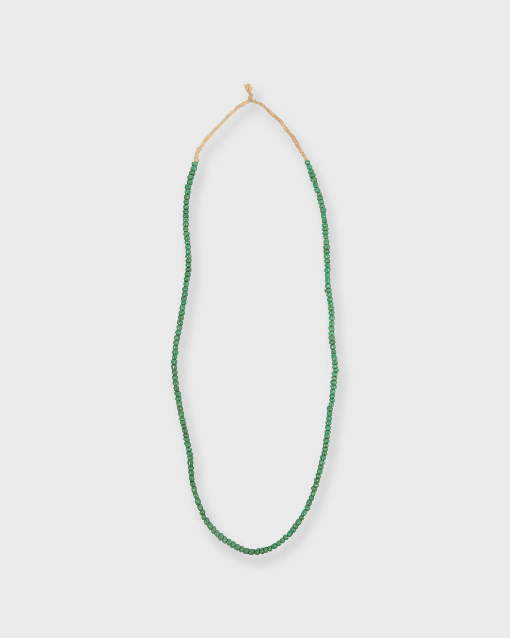 Very Small African Beads in Green sold by Mashburn