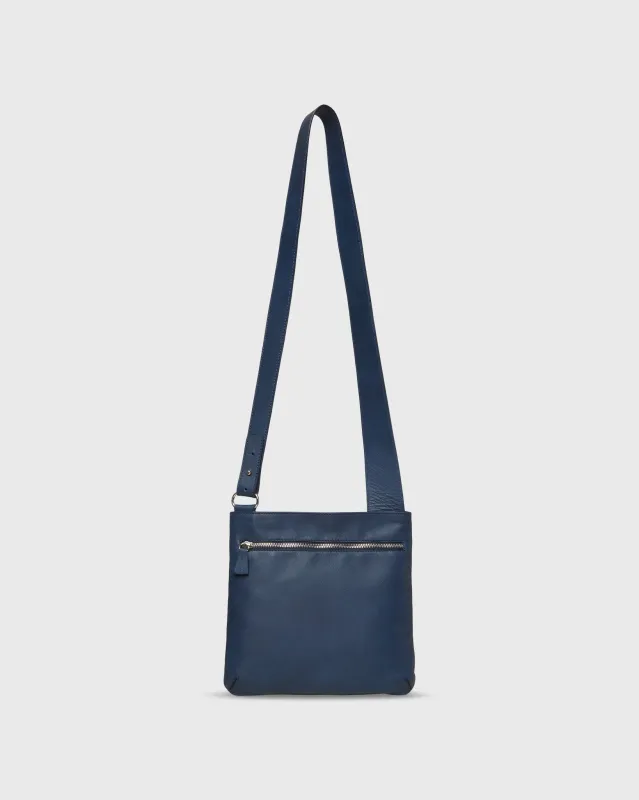 Crossbody Pouch in Space Blue Leather sold by Mashburn