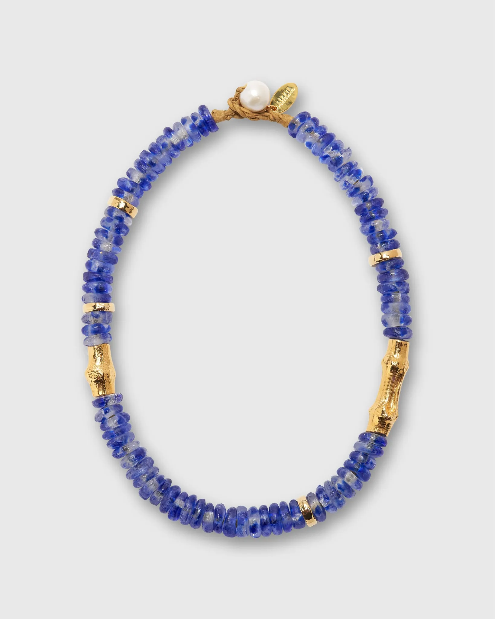 Toga Beach Necklace in Dark Blue Wave sold by Mashburn