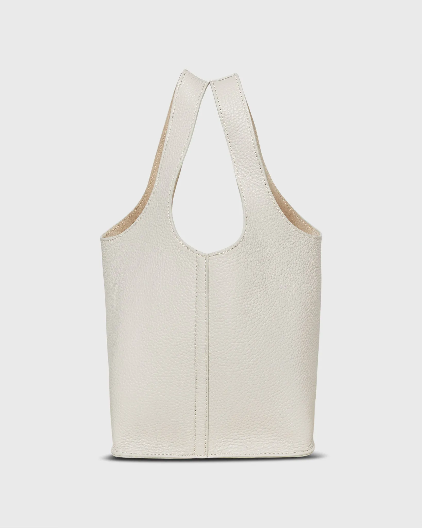 Paola Bucket Bag in Porcelain Leather sold by Mashburn