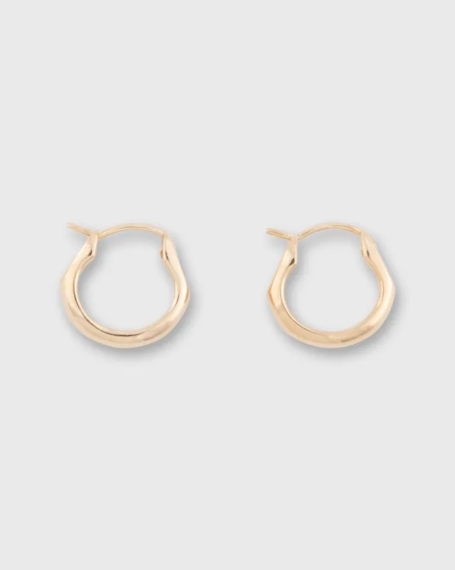 Small Rounded Hoop Earrings in Gold-Plated Brass sold by Mashburn