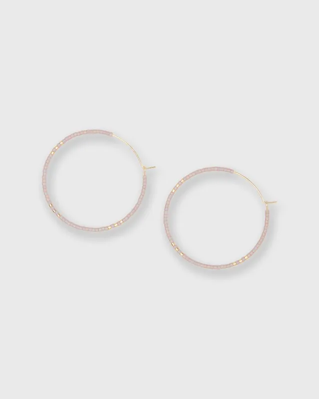 Large Hoop Earrings in Beige sold by Mashburn
