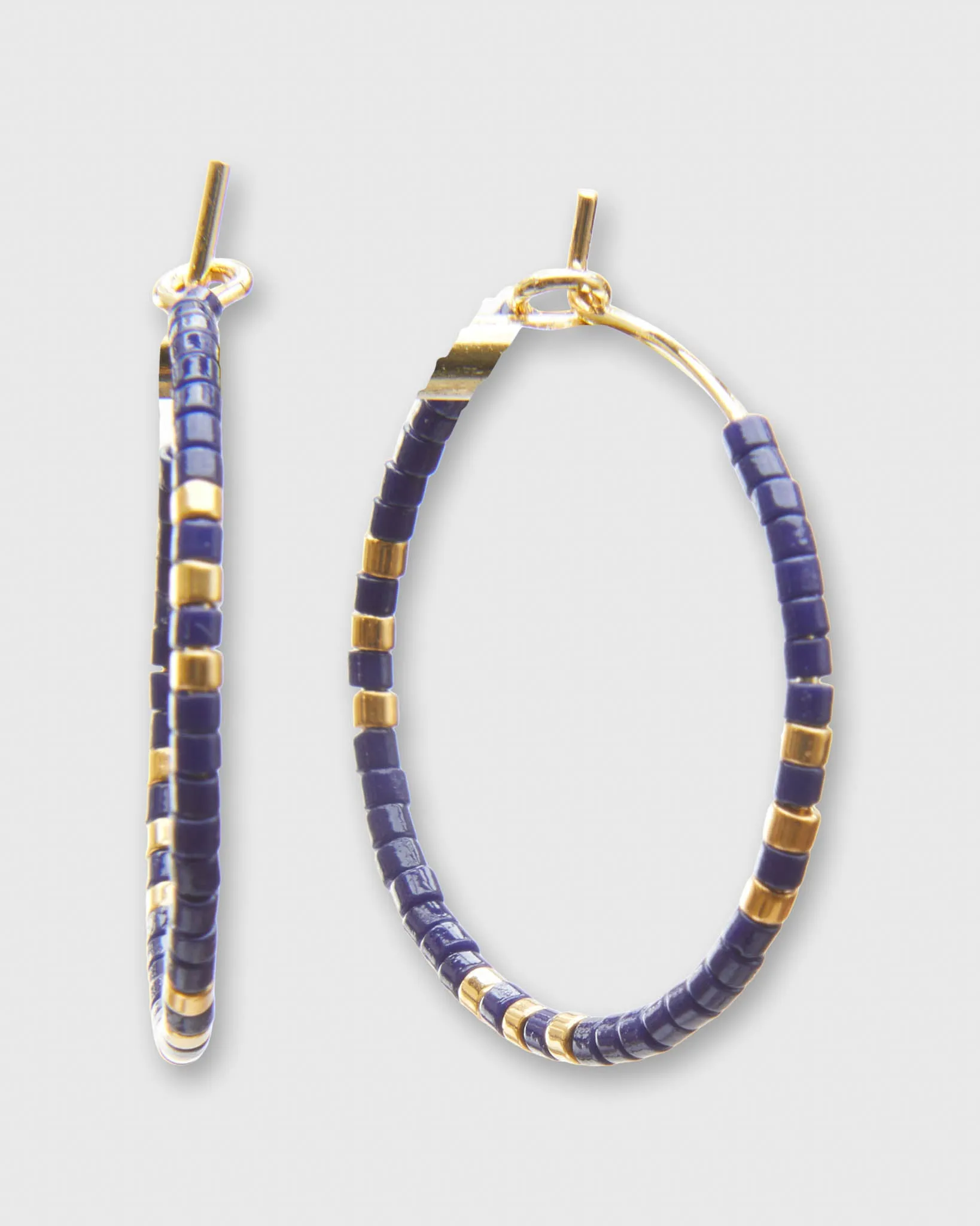 Small Zoe Hoop Earrings in Navy sold by Mashburn
