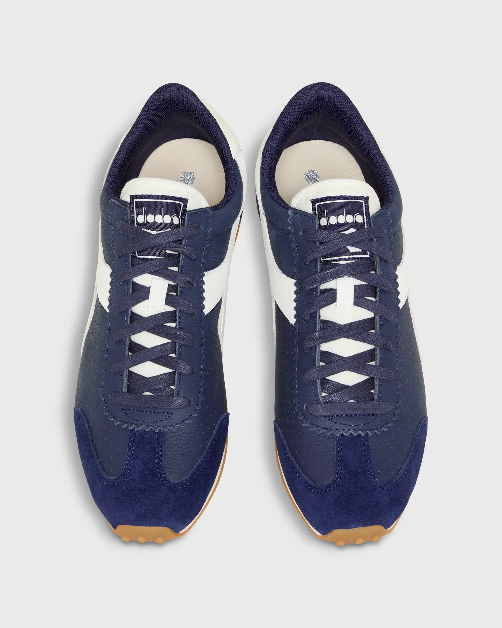 Rally Punched Sneaker in Medieval Blue sold by Mashburn