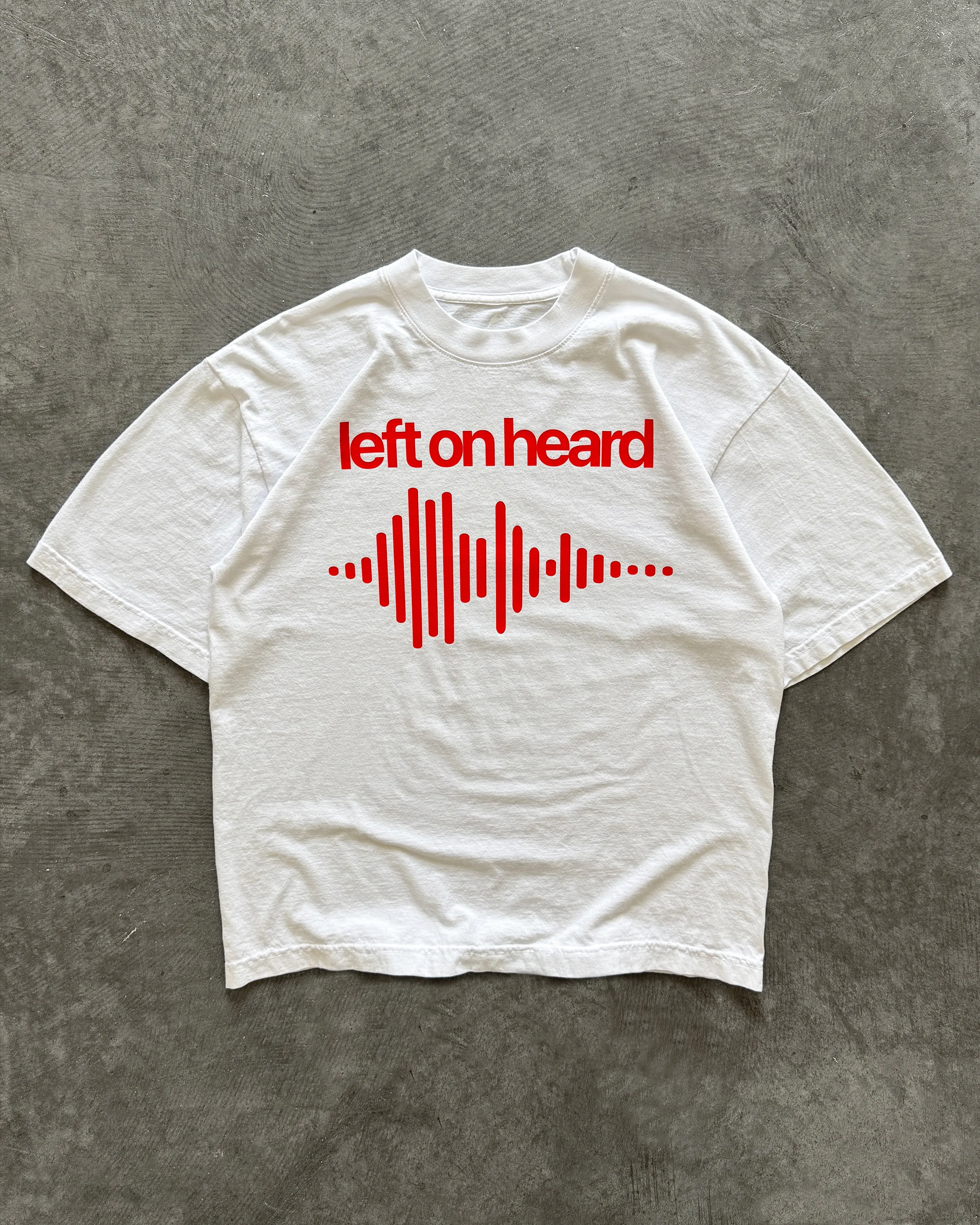 "LEFT ON HEARD" T-SHIRT sold by Artificial Fever