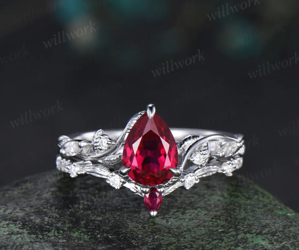 Nature inspired pear ruby wedding ring set solid white gold leaf twig moissanite ring match pear ruby wedding band unique bridal set July birthstone jewelry sold by Willwork Jewelry