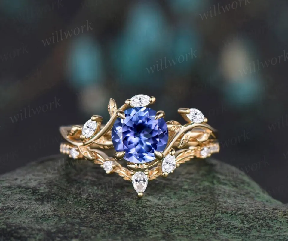 1ct round cut Tanzanite ring yellow gold twig leaf nature inspired engagement ring set jewelry marquise diamond promise ring sold by Willwork Jewelry