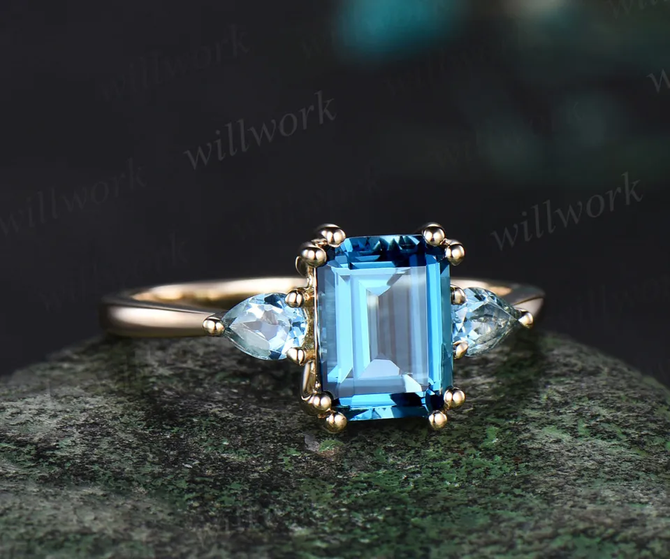 Emerald cut London blue topaz ring Minimalist yellow gold three stone Swiss blue topaz wedding ring women unique engagement ring 8 prong gift made by Willwork Jewelry