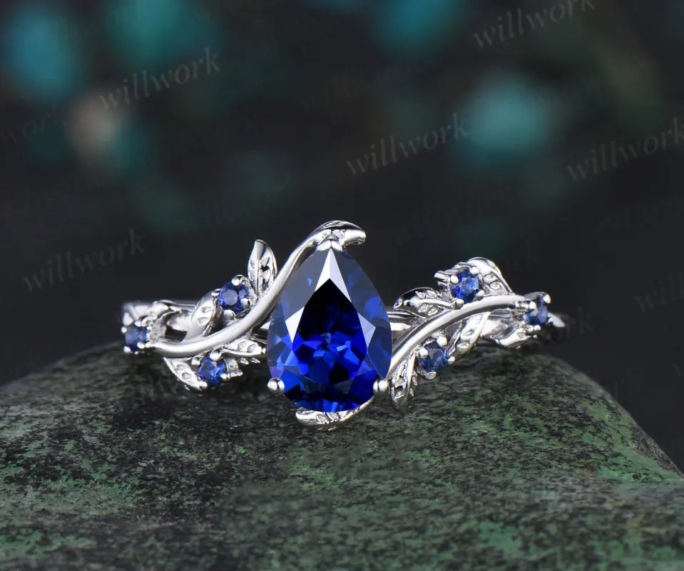 Vintage pear cut sapphire engagement ring nature inspired twig leaf 7 stone September birthstone wedding bridal ring women gift sold by Willwork Jewelry