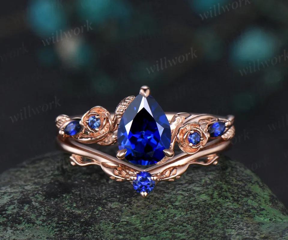 Pear shaped blue sapphire engagement ring set rose gold September birthstone leaf floral flower bridal ring set women sold by Willwork Jewelry