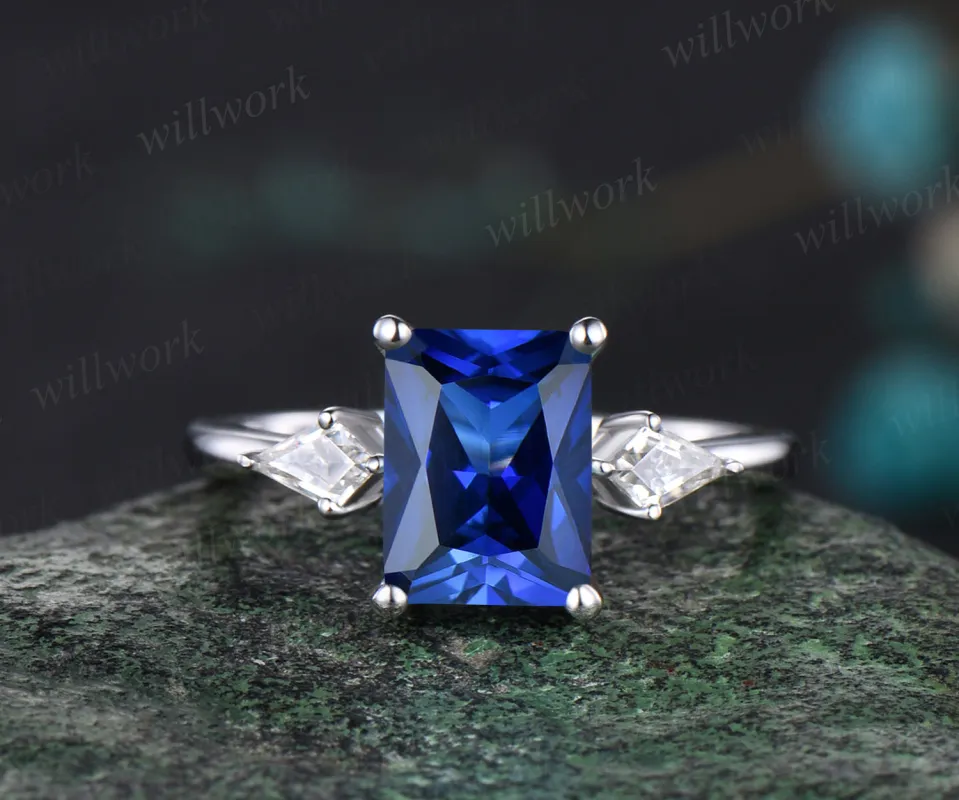 6x8mm Radiant Cut September Birthstone Blue Sapphire Engagement Ring Unique 14k White Gold Kite Moissanite Three Stone Bridal Ring sold by Willwork Jewelry