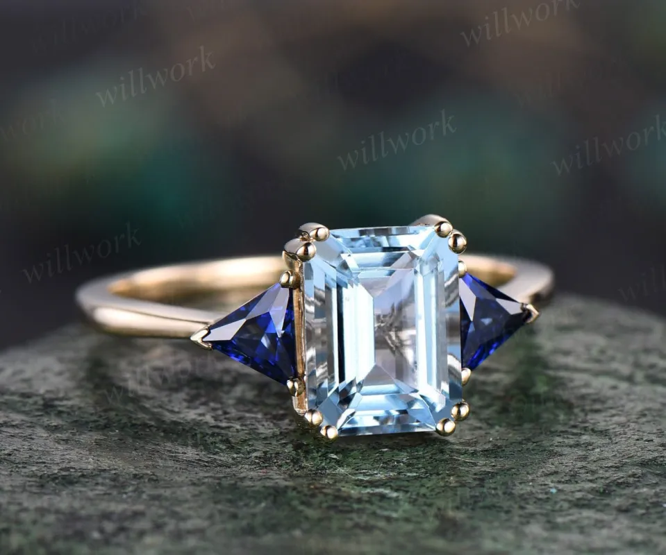 Vintage emerald cut aquamarine engagement ring 14k yellow gold three stone Trilliant cut sapphire ring women blue gemstone ring Fine jewelry sold by Willwork Jewelry