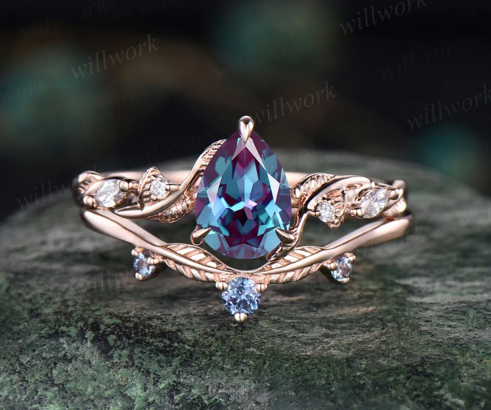 Teardrop alexandrite engagement ring set nature inspired leaf twig pear cut color change gemstone ring art deco wedding band bridal ring set sold by Willwork Jewelry