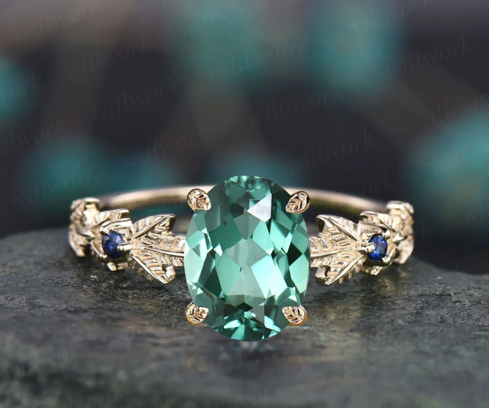 Oval cut teal green sapphire engagement ring 14k yellow gold Nature inspired leaf twig ring blue sapphire promise wedding ring for women sold by Willwork Jewelry