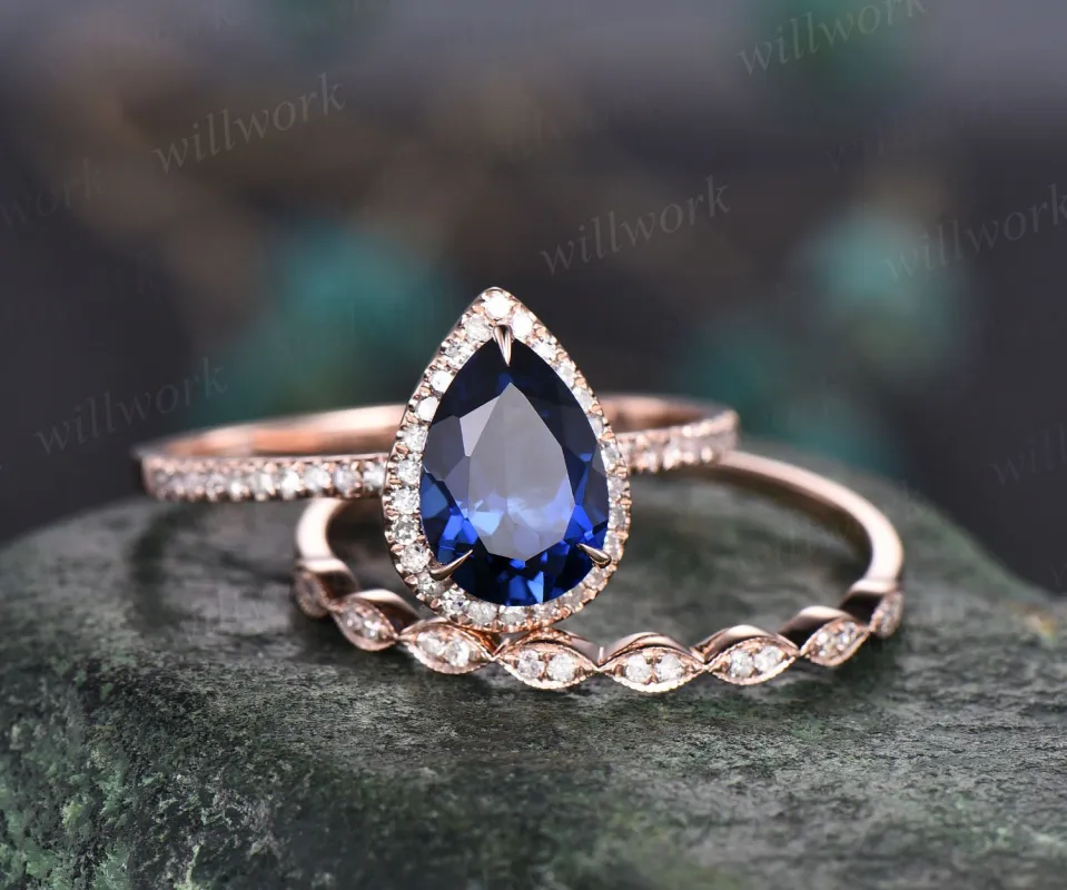 Unique Pear shaped sapphire engagement ring set 14k rose gold halo diamond ring vintage wedding ring set for women September birthstone ring sold by Willwork Jewelry