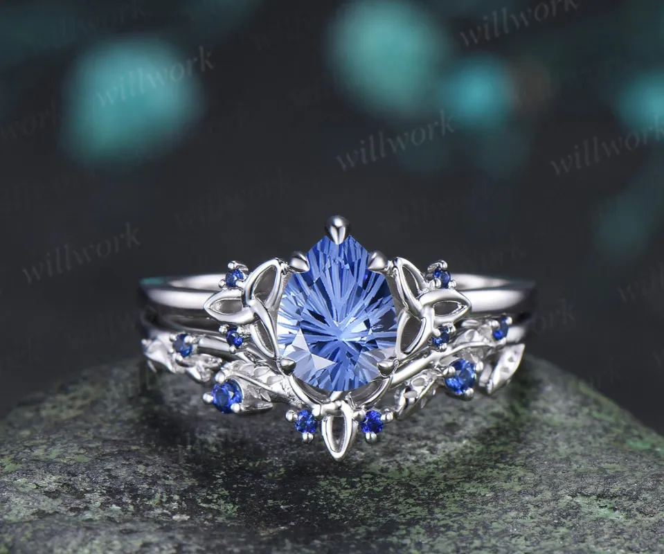 Pear fireworks cut cornflower blue sapphire celtic knot unique engagement ring leaf vintage bridal wedding ring set blue gemstone silver made by Willwork Jewelry