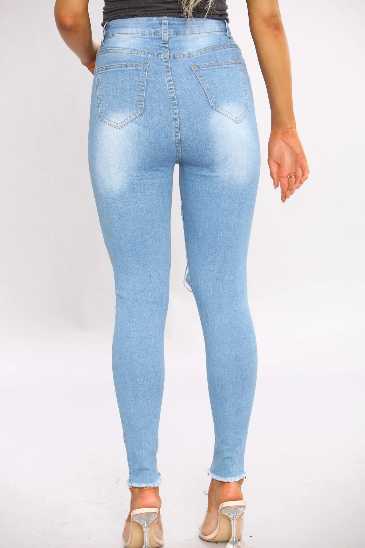 Denim Distressed Blue Wash Ripped Jeans sold by Denimwise