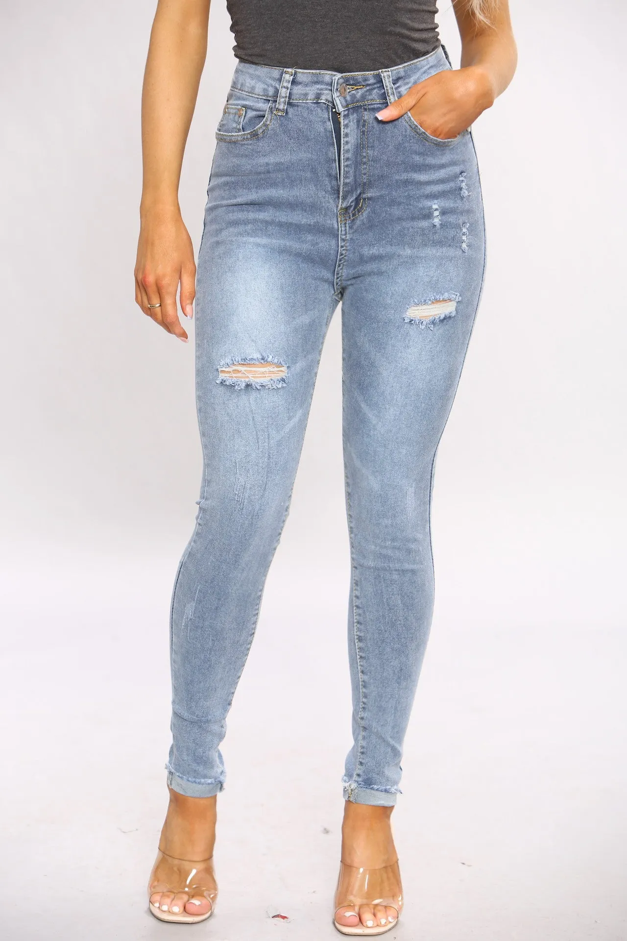 Blue Ripped Knee Skinny Jeans sold by Denimwise
