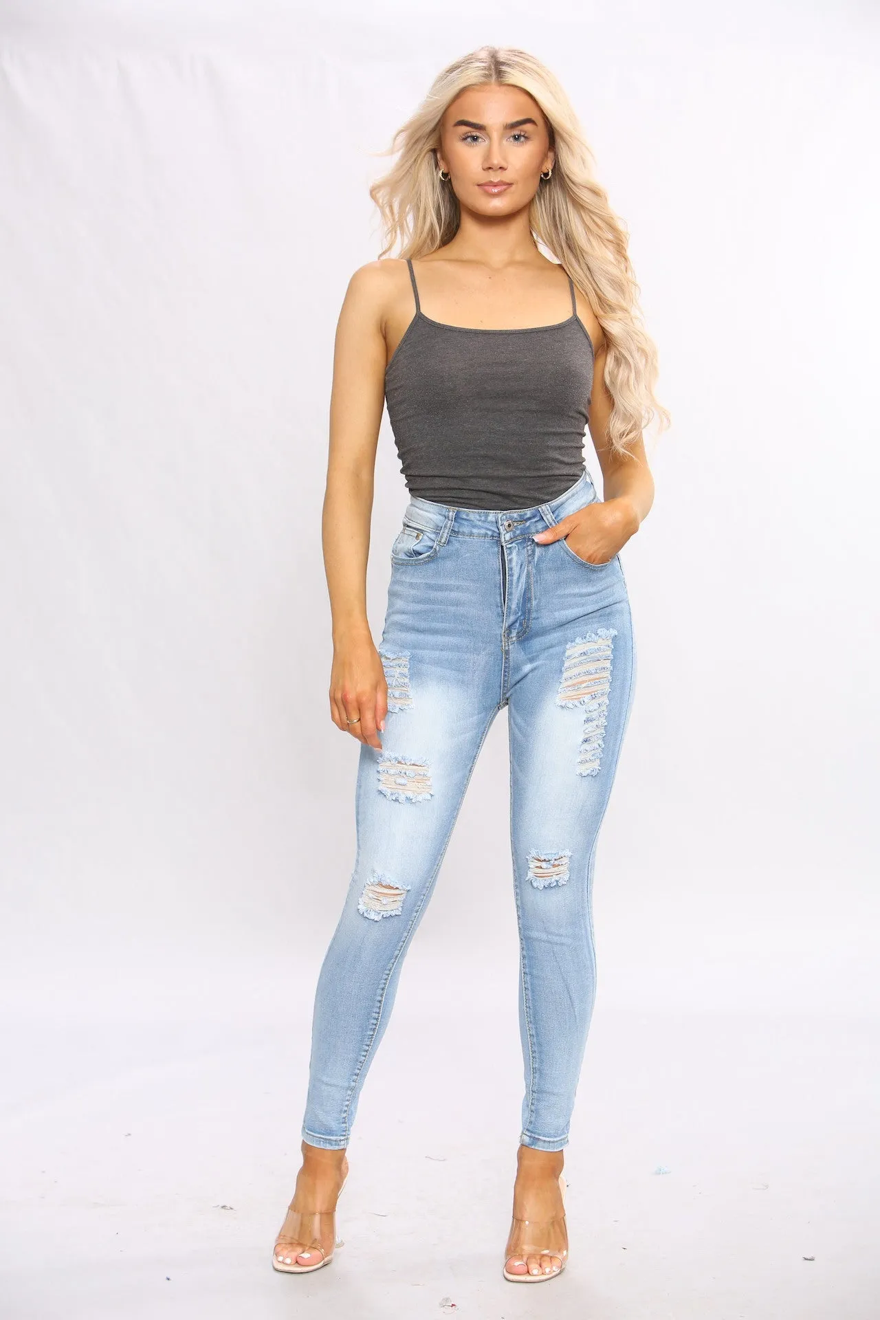 Light Blue Wash Skinny Jeans With Raw Hem sold by Denimwise