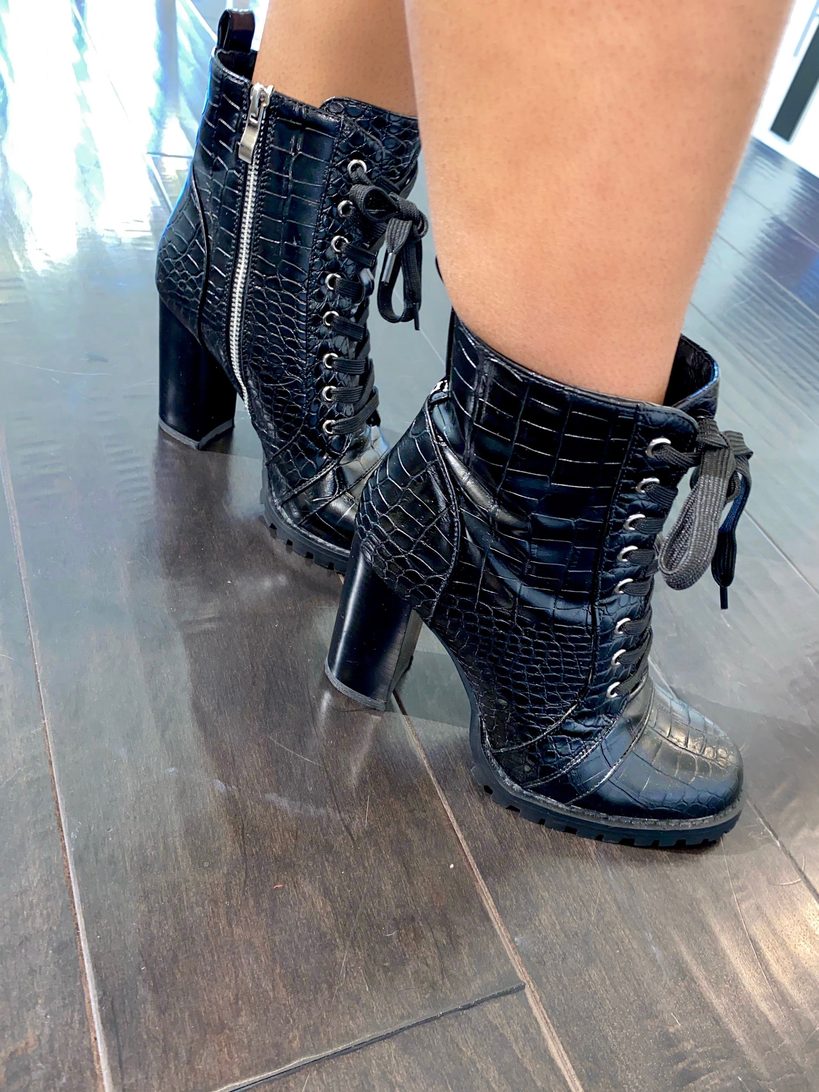 Boss boots sold by Shane Justin