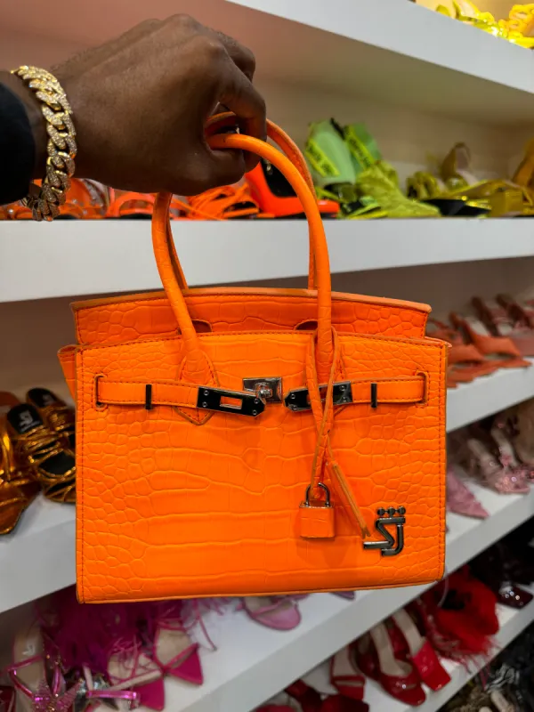 Orange Croc Purse 1 of 1 sold by Shane Justin